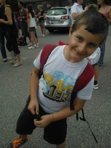 Portrait of Sevan Mammoli as a child in firefighter costume